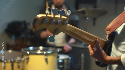 Wallpaper Mural Guitarist skillfully picks out chords on a guitar Torontodigital.ca