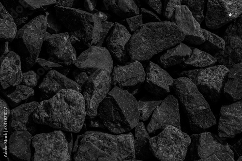 Natural black coals for background design. Industrial coals. Volcanic rock energy on earth. © pattanawit