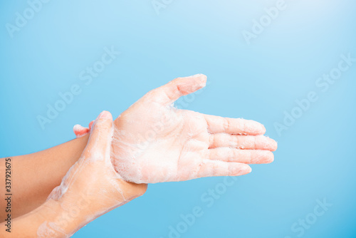 woman washing hands with soap have foam