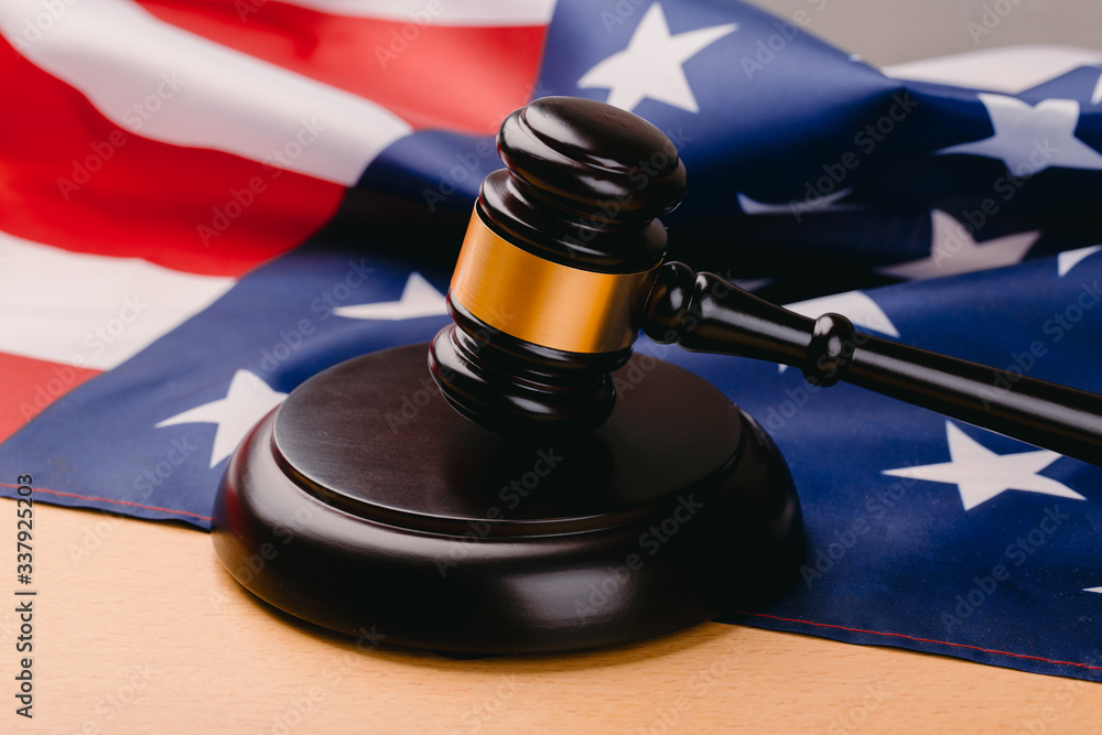 law gavel and USA america flag - American crime concept