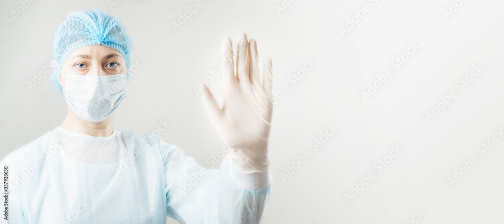 Woman in respirator showing stop gesture. stop viruses concept. Woman in respirator showing stop gesture. stop viruses concept.