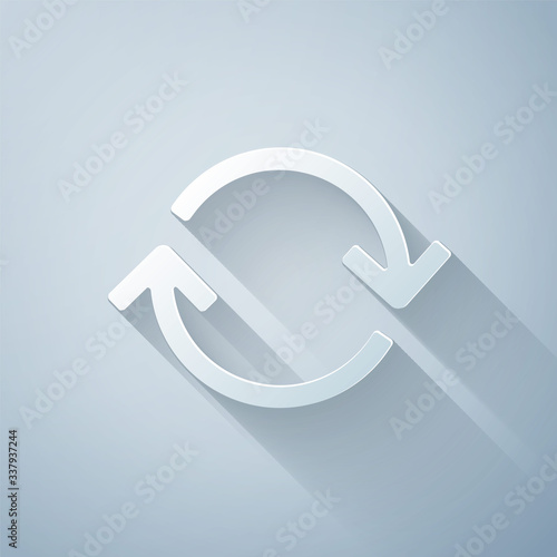 Paper cut Refresh icon isolated on grey background. Reload symbol. Rotation arrows in a circle sign. Paper art style. Vector Illustration
