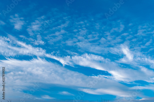 simple blue sky with white clouds in the cool season, freshness and a clear Sunny day in nature 