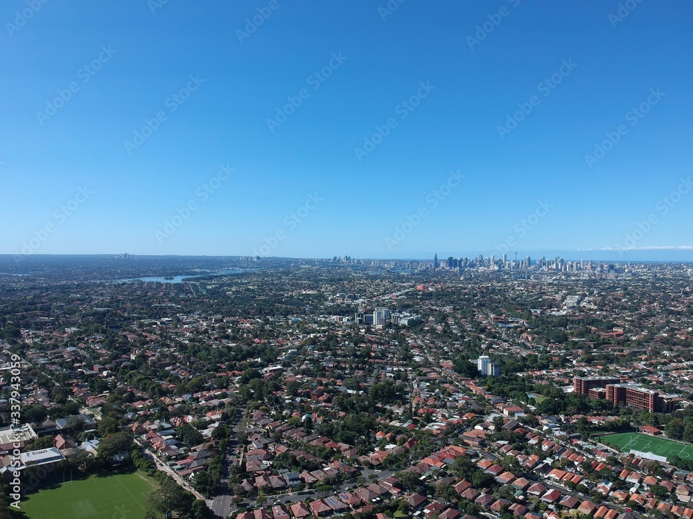 Drone panoramic aerial view of Sydney NSW Australia city Skyline and looking down on all suburbs 