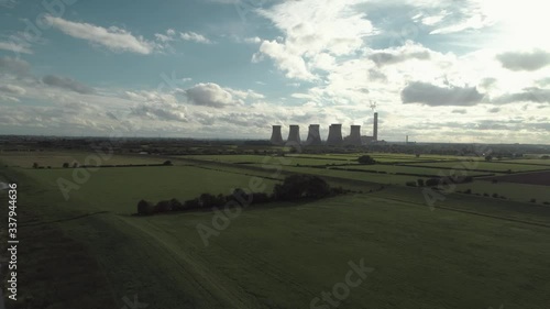 Aerial shot moving towards Willington Power Station over fields and the River Trent photo