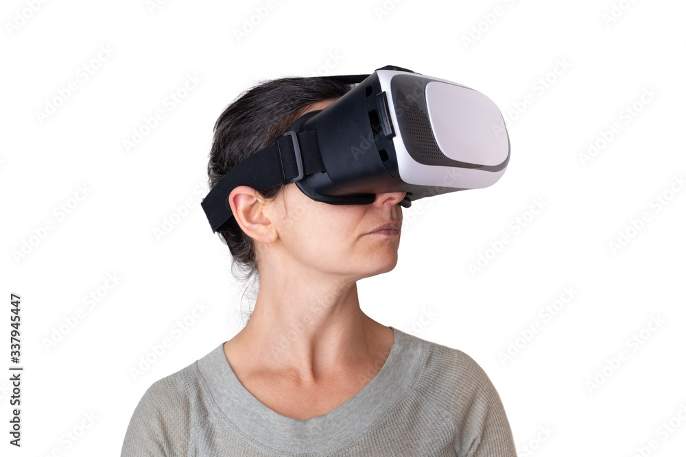 Woman looking up wearing VR headset isolated on white with copy space Woman looking up wearing VR headset isolated on white with copy space