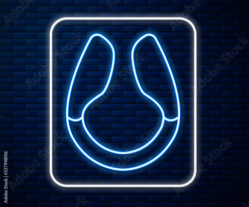 Glowing neon line Dildo vibrator for sex games icon isolated on brick wall background. Sex toy for adult. Vaginal exercise machines for intimate. Vector Illustration