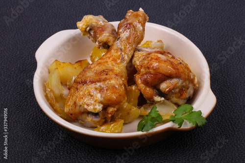 Roasted chicken legs with potato