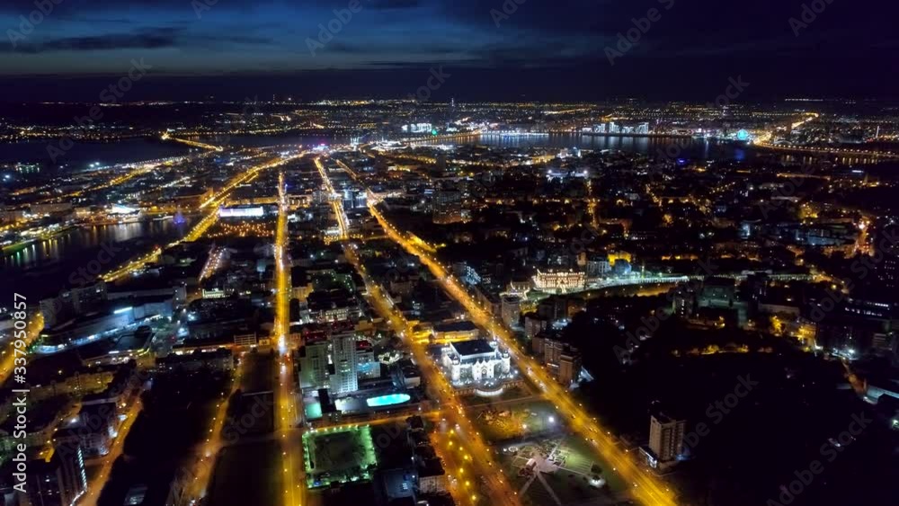 From great height general plan Kazan epic night cityscape backlight skyline. City center river reflection. Road traffic network. All best beautiful attractions Russia Moscow. Aerial cinematic 4K From great height general plan Kazan epic night cityscape backlight skyline. City center river reflection. Road traffic network. All best beautiful attractions Russia Moscow. Aerial cinematic 4K