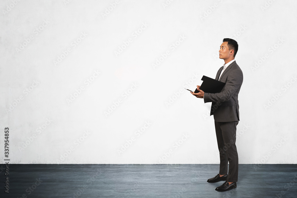 Confident businessman with clipboard, mock up Confident businessman with clipboard, mock up