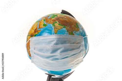 Planet Earth with face mask protect. World medical concept