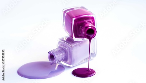 nail Polish various shades of pink poured from a bottle