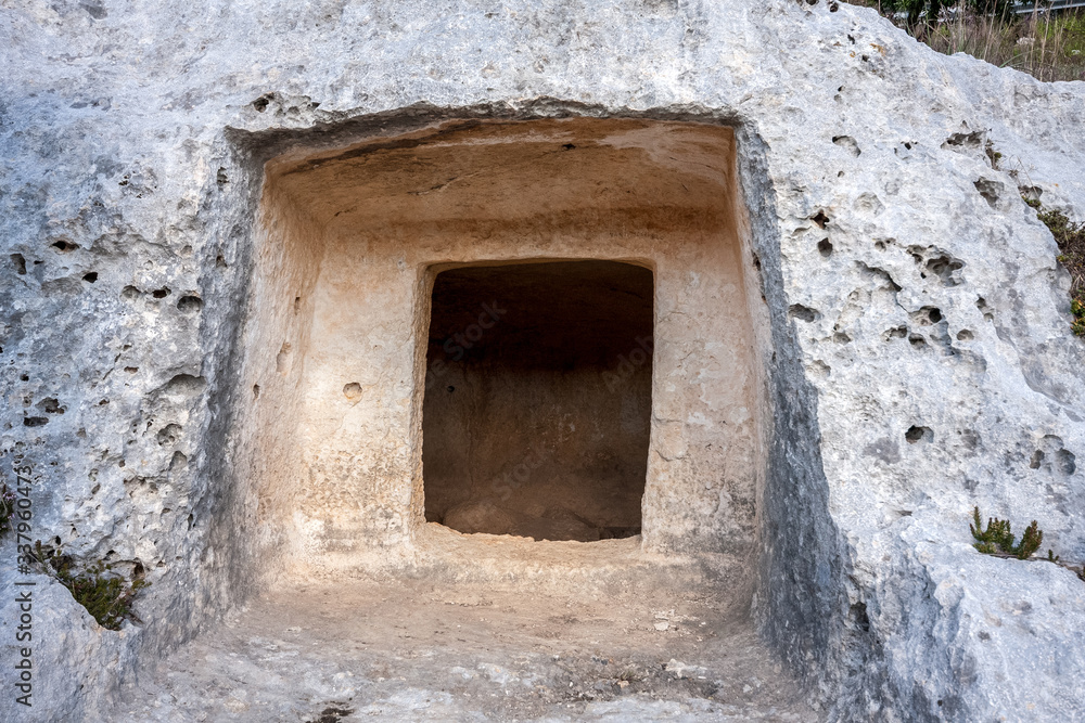 Prehistoric tombs in the Unesco site of Pantalica. Necropolis of Pantalica, Sortino, Syracuse, Sicily, Italy.