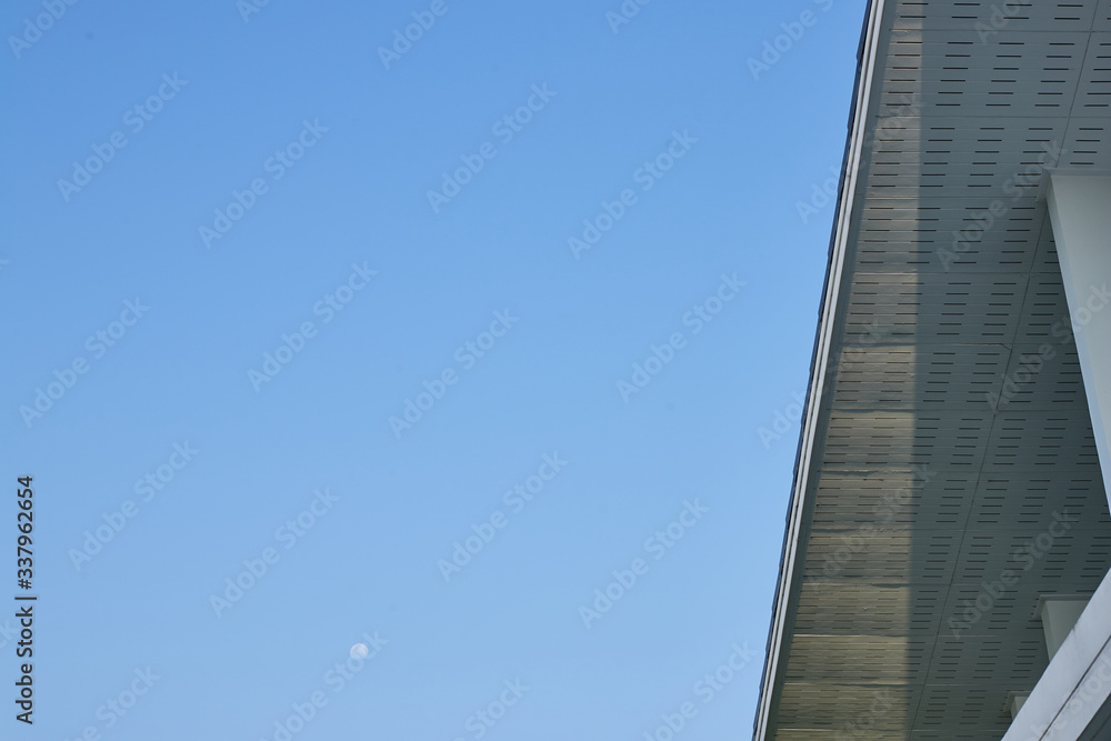 The roof and ceiling with the sky as the background The roof and ceiling with the sky as the background