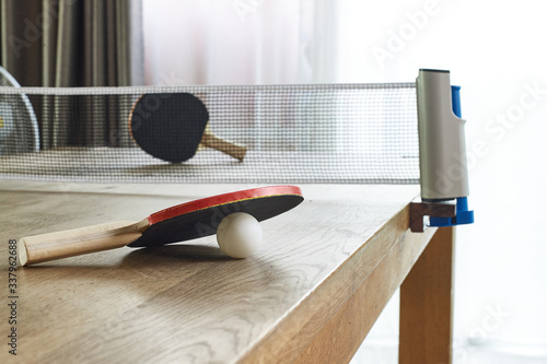 DIY. Table tennis at food table in the house