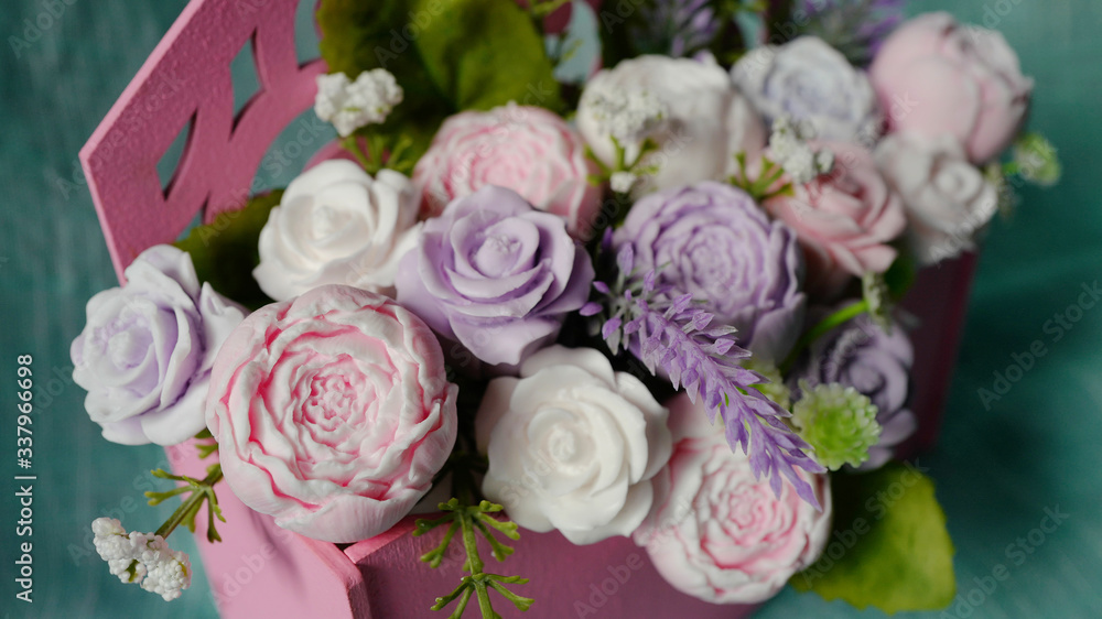 Fototapeta premium Bouquet of soap flowers in pink envelope