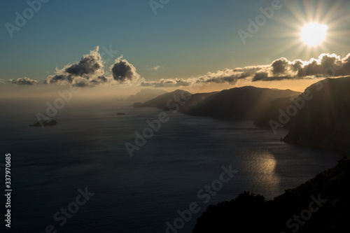 Beautiful view of Amalfi coast seen from the Path of the Gods  Sentiero degli Dei  with Li Galli and Capri Island on the background at sunset. Route from Agerola to Nocelle  Positano  Campania  Italy