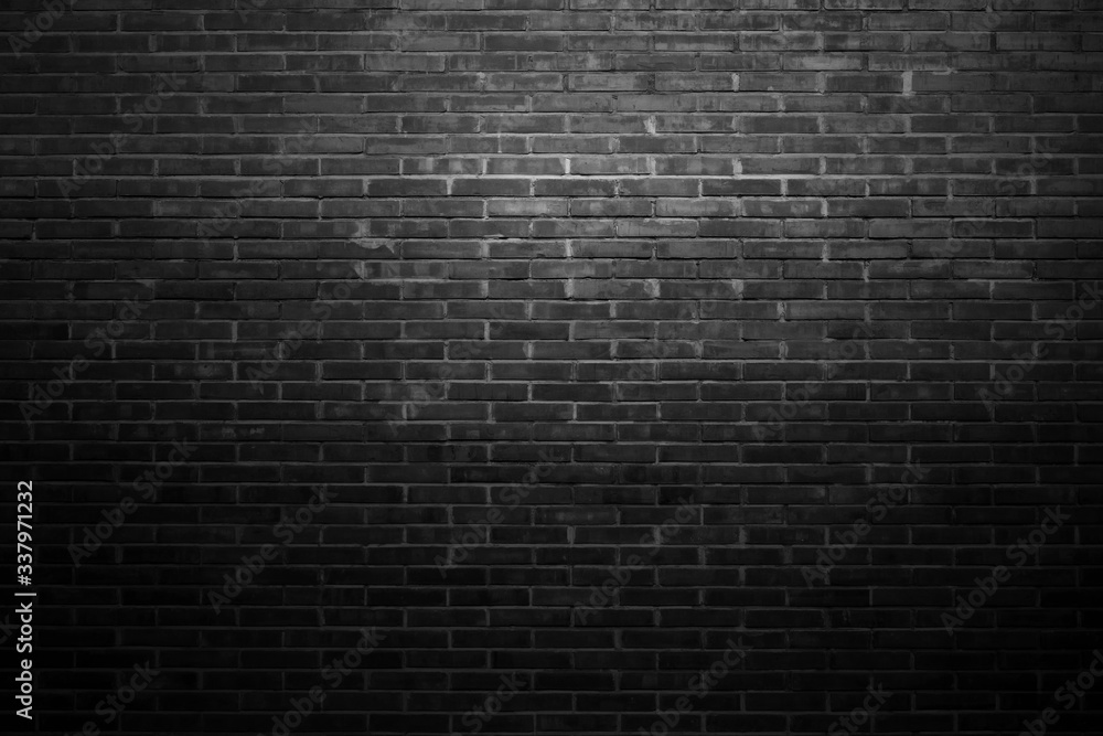 Fototapeta premium The black wall surface uses a lot of bricks. Or old black brick wall abstract pattern. Put together beautifully dark background.