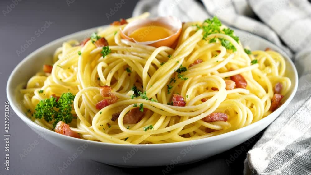 carbonara spaghetti with egg, bacon, cream and cheese carbonara spaghetti with egg, bacon, cream and cheese