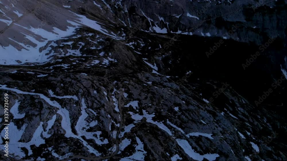 Drone aerial flying near Tre Cime di Lavaredo mountain in Sexten Dolomites Italy at sunset. Hiking nature epic landscape in South Tirol. European Alps wanderlust. Drone aerial flying near Tre Cime di Lavaredo mountain in Sexten Dolomites Italy at sunset. Hiking nature epic landscape in South Tirol. European Alps wanderlust.