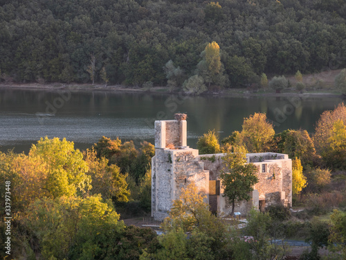 Church of the former abandoned village of Garaio at the Ullibarri-Gamboa Reservoir, Alava, Basque Country, Spain photo