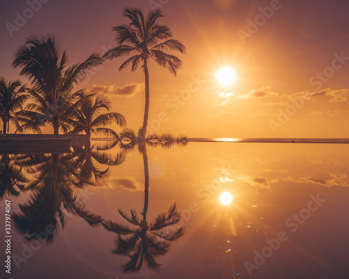 Fototapeta Naklejka Na Ścianę i Meble -  A reflected sunrise in Mauritius 