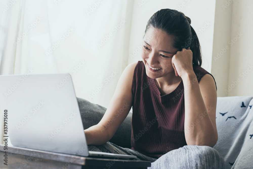 work from home.using computer.hand typing keyboard laptop online chatting search form internet while working sitting on sofa.concept for technology device contact communication business people work from home.using computer.hand typing keyboard laptop online chatting search form internet while working sitting on sofa.concept for technology device contact communication business people