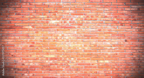 The background of the brick wall with dark orange is beautifully arranged. Ancient wall Grunge background The backdrop may be used in interior design.