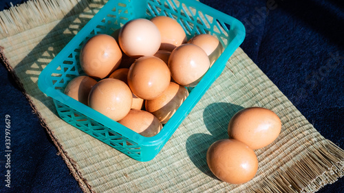 Chicken eggs with a black background, chicken eggs with natural light, chicken eggs are the food that every home needs, chicken eggs are very useful and protein.