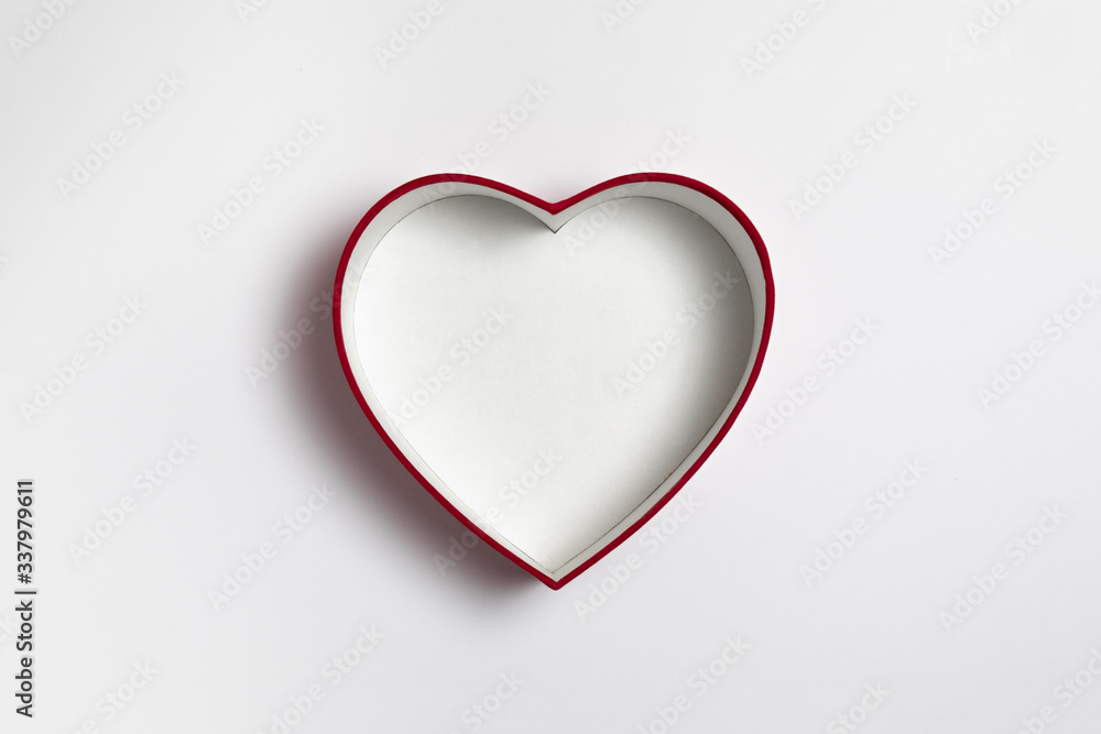 Red Heart Box for Valentine's day or special day in love concept. Open empty red gift box with a heart shape isolated on white background. High-resolution photo.Mock-up.