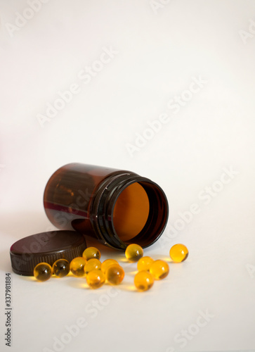 pills and vitamins on a white background
