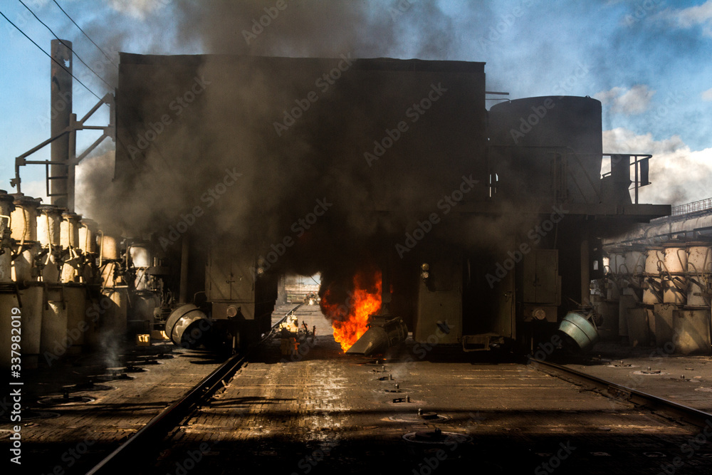 The upper roof of a closed-type coke oven battery. Valves are visible to release excess pressure in the battery during sintering of coal coke.