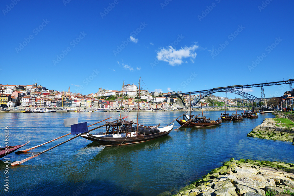 Rabelos boats in Douro river near to the Dom Luis bridge, Porto Portugal .PORTO, PORTUGAL, MARCH 2015