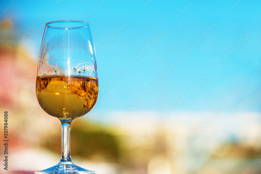 Reflection of Porto city in a white wine glass,Copy space, shallow doff, soft focus
