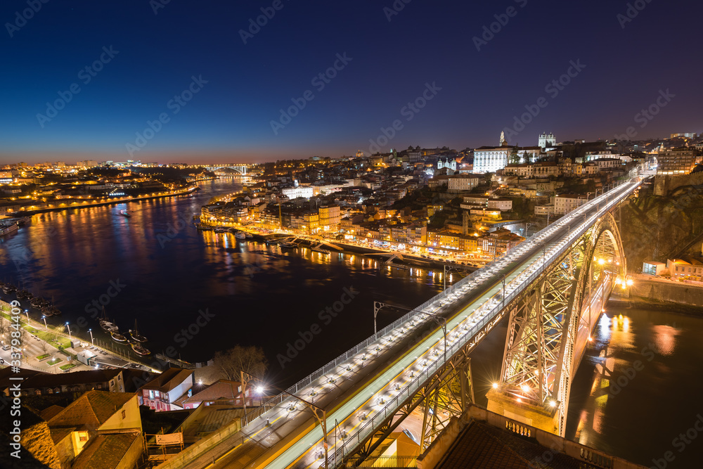 Bridge of Luis I at night over Douro river and Porto cityscape, Portugal