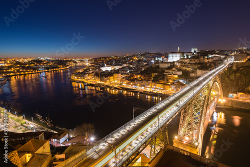 Bridge of Luis I at night over Douro river and Porto cityscape, Portugal