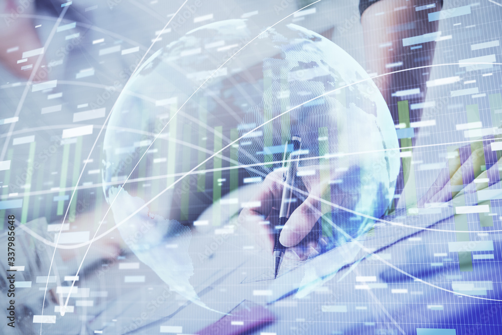 International business hologram over hands taking notes background. Concept of success. Multi exposure International business hologram over hands taking notes background. Concept of success. Multi exposure