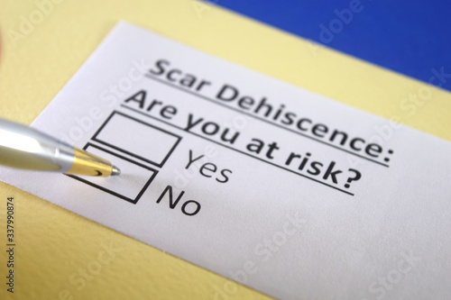 One person is answering question about scar dehiscence.