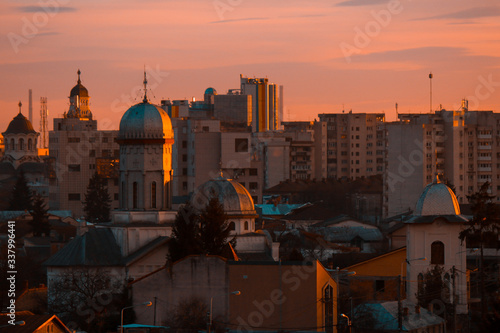 Old city buildings in the dusk , The city of Ploiesti , Romania in the golden light © Mihai