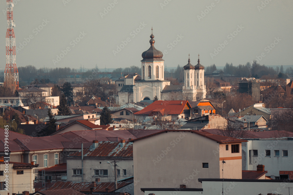 Old city buildings in the dusk , The city of Ploiesti , Romania in the golden light