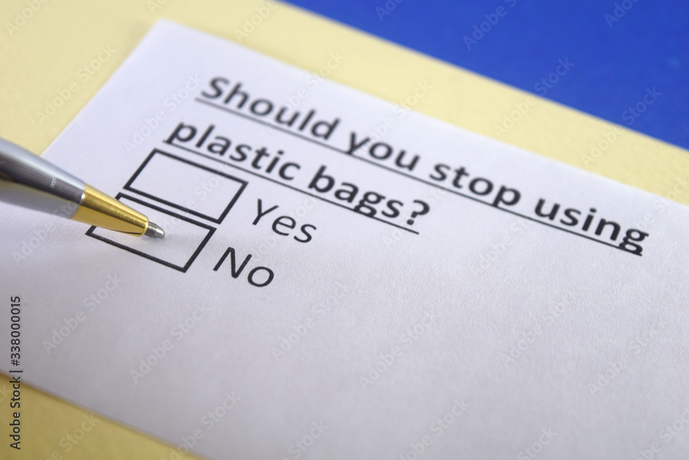 One person is answering question about plastic bag use. One person is answering question about plastic bag use.