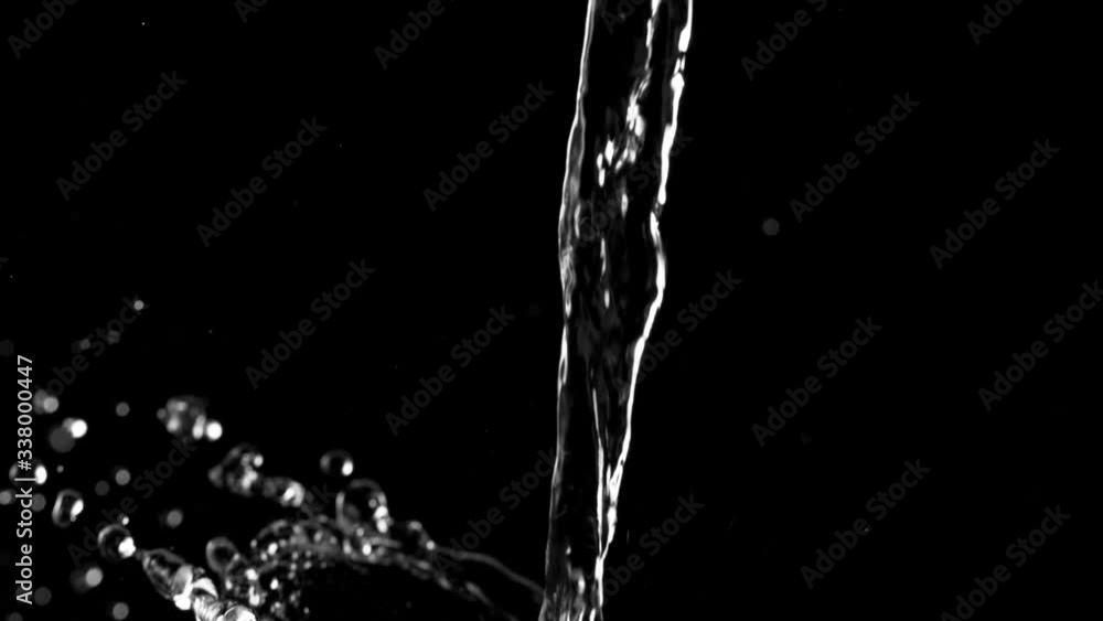 Super slow motion of pouring splashing water on black background. Filmed on high speed cinema camera, 1000fps. Super slow motion of pouring splashing water on black background. Filmed on high speed cinema camera, 1000fps.