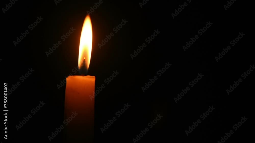 Candle light on dark background Candle light on dark background
