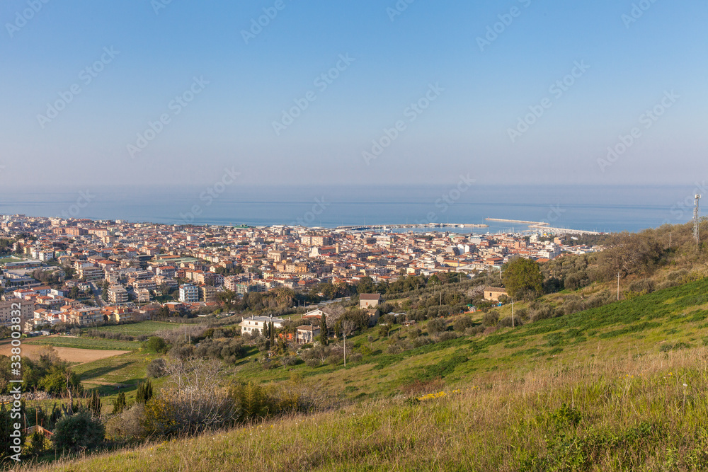 Obraz premium San Benedetto del Tronto cityscape in the sunset light. A beautiful city in Marche region, on the Adriatic sea, Italy