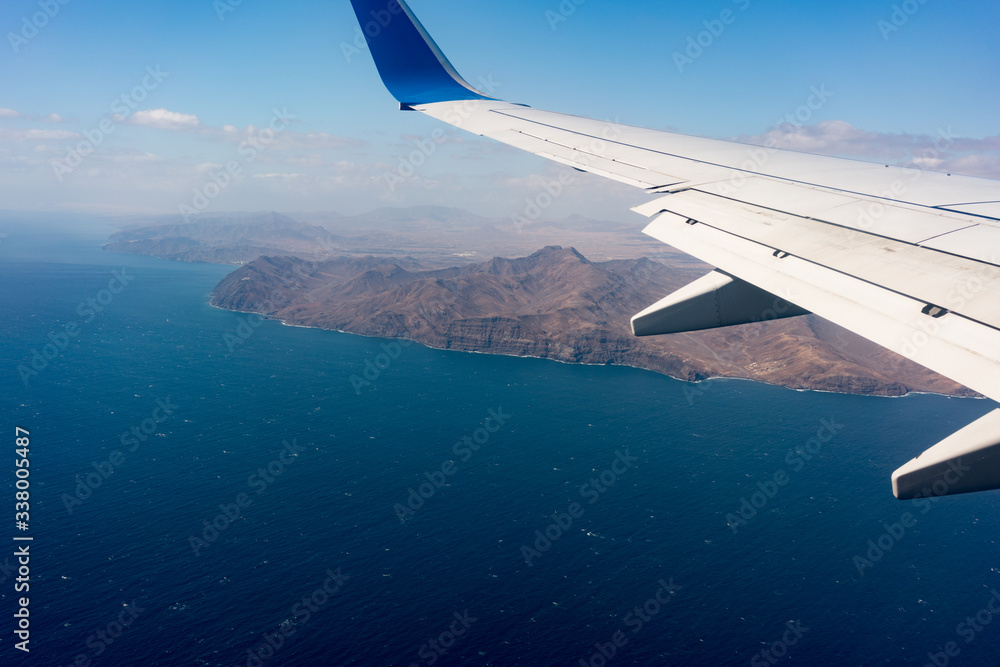 Fototapeta premium Canary Islands mountain landscape under airplane wing