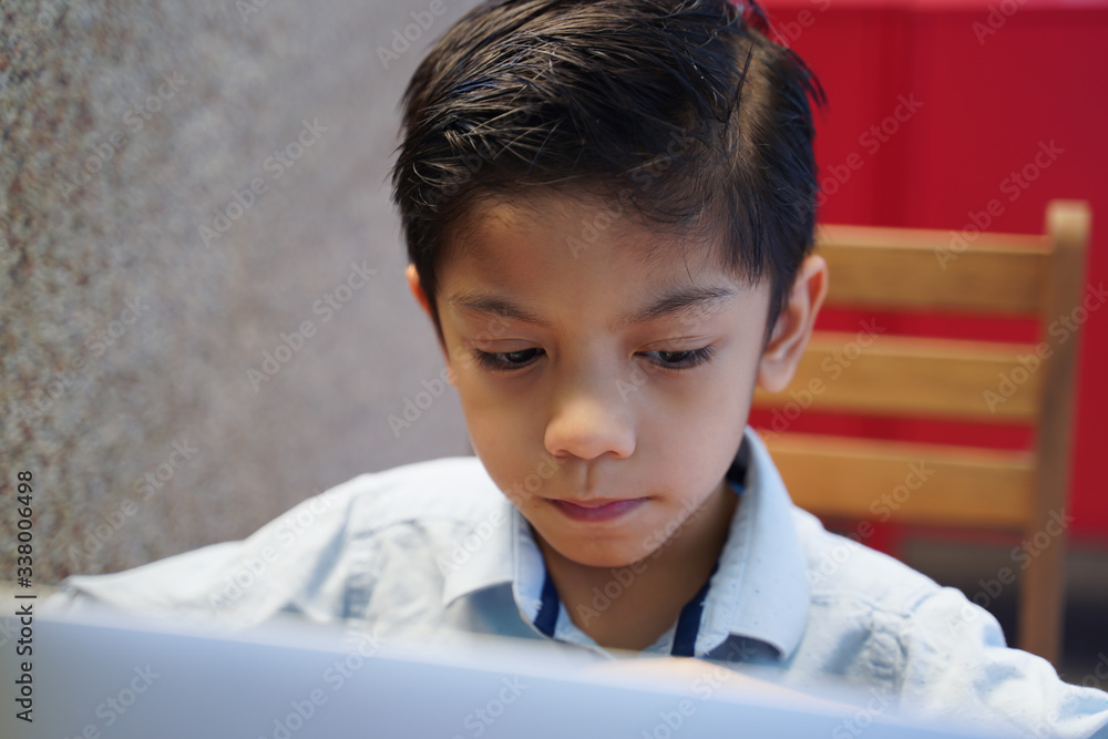Children learning using laptop computer at home. Learn from home quarantine concept. Children learning using laptop computer at home. Learn from home quarantine concept.