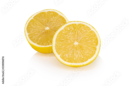 Closeup fresh lemon fruit slice isolated on white background, food and healthy concept