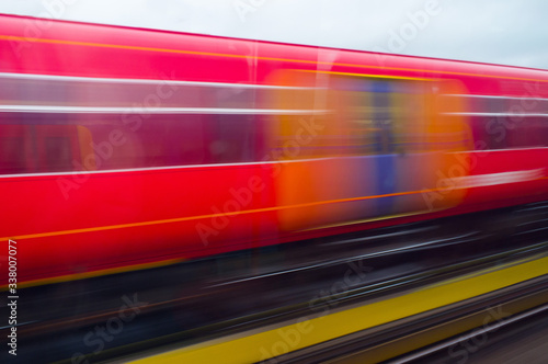 Railway train moving at speed - blurred