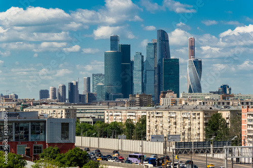 Large panoramic view of Moscow city buildings  a modern business center on the banks of the Moscow river on a bright Sunny day. The view of Moscow state University.