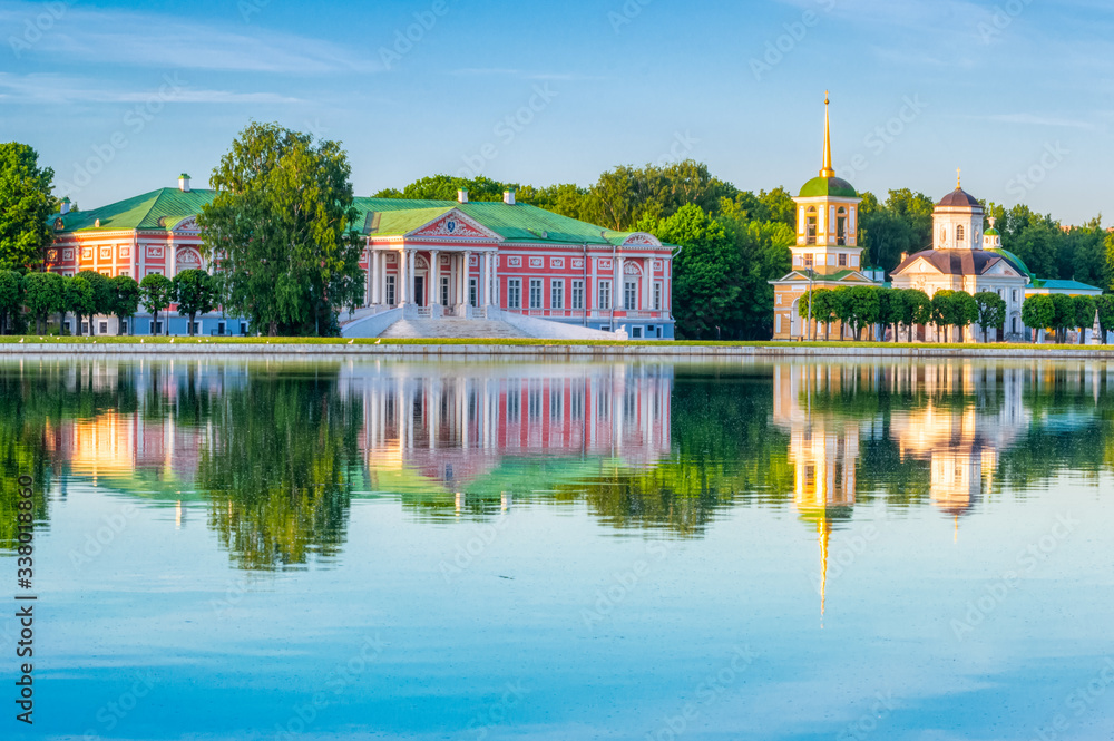 Kuskovsky Park, pond and Kuskovsky Palace at sunset. The estate of the Sheremetev family was built in 1769-1775. The Museum in Kuskovo.